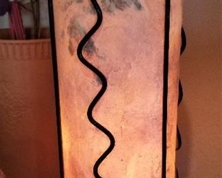 Unique lamp that can be used in a modern or southwest setting.