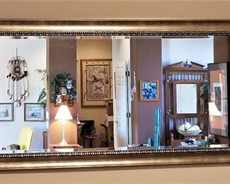 Lovely wide mirror that really brings light into a room.