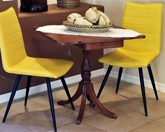 Mid-century modern yellow chairs. Set of 4.Antique game table that folds and turns.