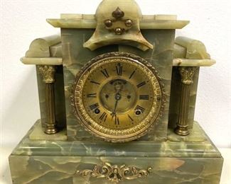 For your consideration is this Antique Marble Clock, Ansonia, AS IS.  Appears to have original movement.  We did not test for functionality but the inside appears to be in excellent shape.  Heavy clock, shipping may be expensive.  Measures approx. 14" x 5.5" x 12.5"
