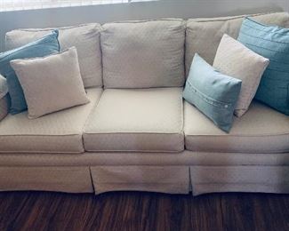 White Fabric Sofa is 31" tall, 3' deep, 76" wide.