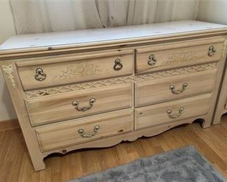 Lot 109
Blonde wood Dresser with decorative art