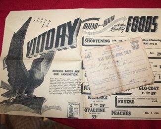 grocery flyer advertising war bonds, and a ration book with stamps