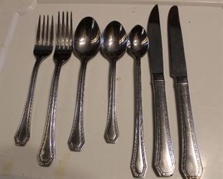 large set of Reed and Barton stainless flatware