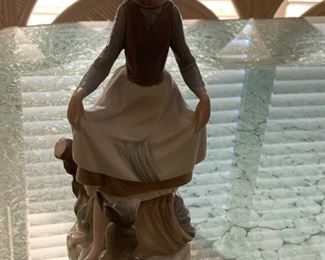 #18	Lladro girl  with rabbit  in apron  9 inch tall 	 $75.00 
