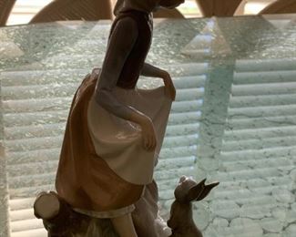 #18	Lladro girl  with rabbit  in apron  9 inch tall 	 $75.00 
