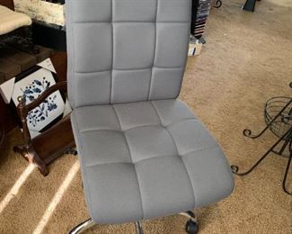 #65	Gray/chrome Office Chair on wheels	 $30.00 
