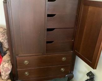 #82	Bachelors Chest w/2 doors, 4 drawers Mahogany (as is latch)  34x21.5x51	 $175.00 
