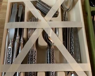 #93	Reed & Barton 14-4 place Setting Stainless  w/ice teas & serving spoons	 $60.00 
