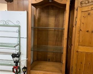#102	(2) Pine Carved Display Cabinets w/2 glass shelves 32x24x82 (you move upstairs)  $75 each	 $150.00 
