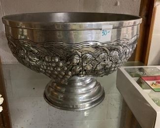 #105	Silver Finish Grape Pattern Punch Bowl 16.5 round x 12"Tall	 $30.00 

