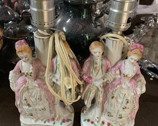 #116	(2) Lamps w/lady & Man Porcelain 10" Tall - sold as a pair	 $20.00 
