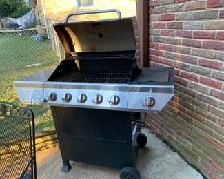 #212	Nexgril Gas Grill 4 burner grill w/tank - as is	 $50.00 
