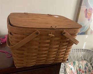 #273	Longaberger picnic basket with plastic liner and wood stand flip up top 2 handles	 $28.00 
