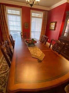 Formal Dining Room set (table that has 2 leaves, 6 wooden chairs w/ upholstered seats & 2 upholstered side chairs included that seats 8 people comfortably)