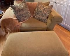Chair and a half w/ ottoman & 2 oversized throw pillows.