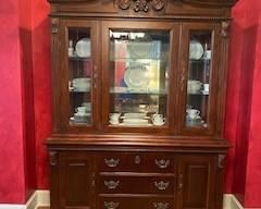 Beautiful formal china cabinet that matches dining table. Has 2 cabinets & 3 drawers at the bottom, one comes with felt & designed for silverware. Glass part of cabinet has inside glass shelves & cabinet doors for placing or removing china - BEAUTIFUL!