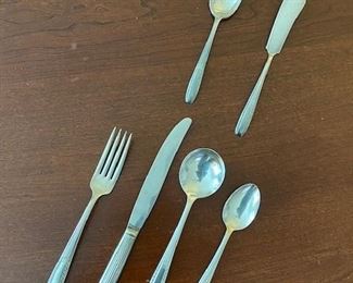 Antique silver-place silverware. Was given to me by my grandmother & I have never used it.  Also has some demitasse spoons that are offered with the set.