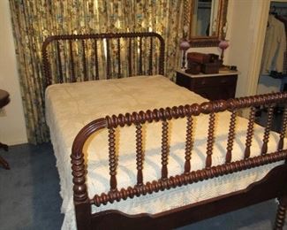Full size antique spindle bed