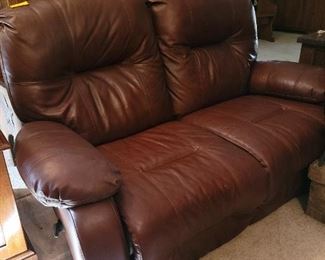 Leather couch both sides recline