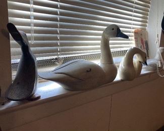 carved aviary figurines