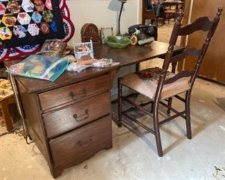 Small wooden desk with chair
