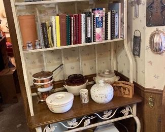 bakers rack, cookbooks, copper fondue pot