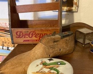 Dr. Pepper carrier and wooden foot last