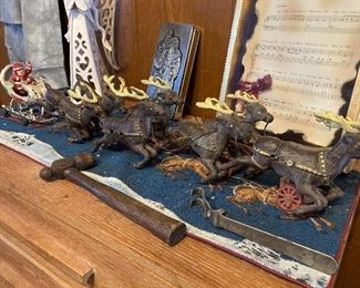 cast iron Santa sleigh with articulated reindeer team