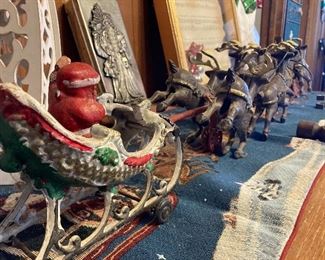 cast iron Santa sleigh with articulated reindeer team