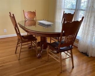 Oak table and chairs with plate glass protective top