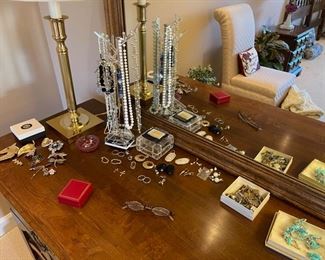 Costume jewelry, gold, silver and gemstone estate jewelry. 