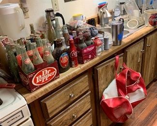 Coke bottles and Duffle bag