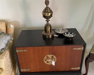 Oriental end table. One of a pair 