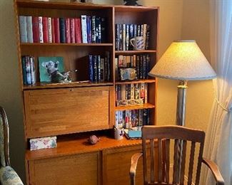 Unique bookcase with pull down panel 