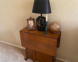 Vintage fold up side panels with storage in between dining table