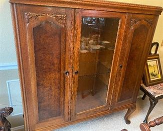 Antique china cabinet with middle glass display