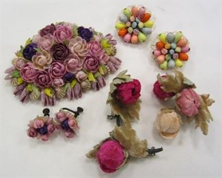 THREE FELT SMALL CORSAGE PINS
A PAIR OF W. GERMAN FRUIT LIKE CLIP ON EARRINGS
A 3 3/8" WIDE PIN MADE FROM A CLAM SHELL, ENCRUSTED WITH ROSETTES AND FLOWERS MADE FROM MINI SHELLS.  HAS MATCHING EARRINGS