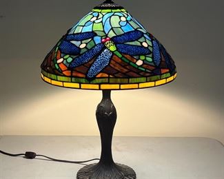 STAINED GLASS LAMP | Table lamp with a Tiffany style stained glass lampshade with dragonfly motifs and metal base; h. 24 x dia. 16-1/2 in.