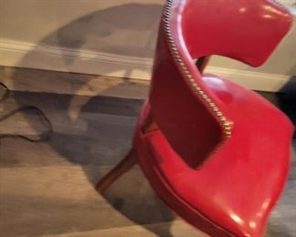 $40 red leather chair with brass trim