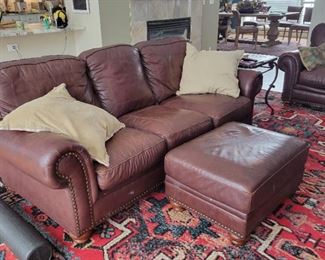 $200  leather sofa with nailhead trim with ottoman