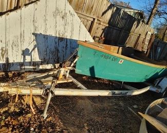 Nice plywood and fiberglass boat. 17'? With trailer. Motor available.