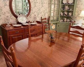 Queen Ann Style Dining Table with Eight Ladder Back Chairs and Two Table Leaves
