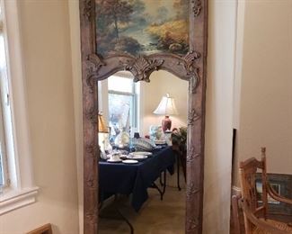 large mirror with pastoral scene