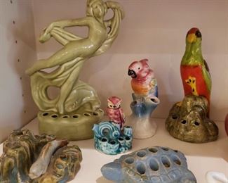 antique figural flower frogs