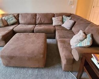 1 of 2 Suade Leather Sectional and Footstool by Ashley Furniture