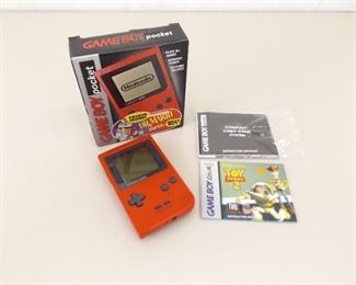 Vintage Gameboy Pocket Red With Original Box, Manual, and Toy Story Game

