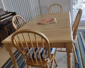 Maple Dining Table with 4 Spindle Back Chairs.  Pull apart with Pop Up, Built In Leaf