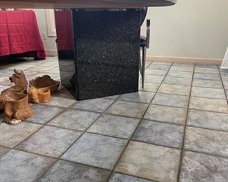 granite table with 10 matching chairs 