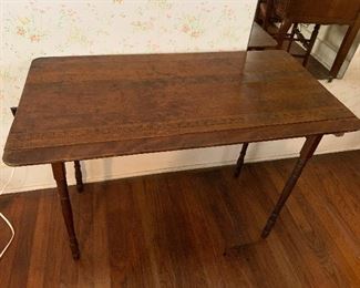 Antique Fold Up Sewing/Material Table - with original tag on the bottom, Made in the USA in Paris City.  Has measuring on the top of the table, with a groove to run sissors down. JUST ADORABLE. See next picture for close up.  $145 